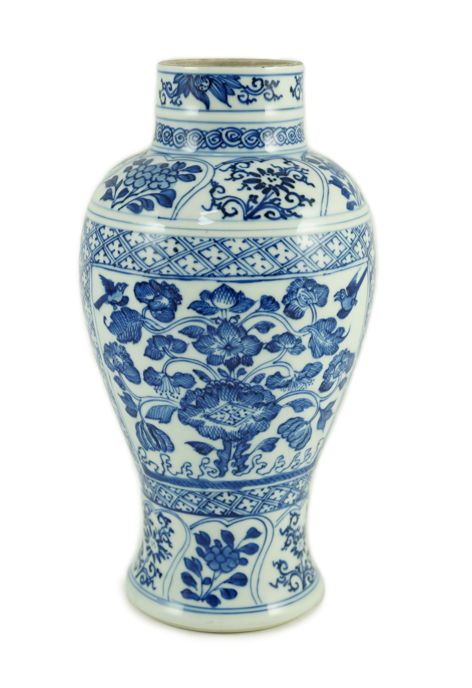 A Chinese blue and white vase, Kangxi period, 21cm high, hairline crack to neck